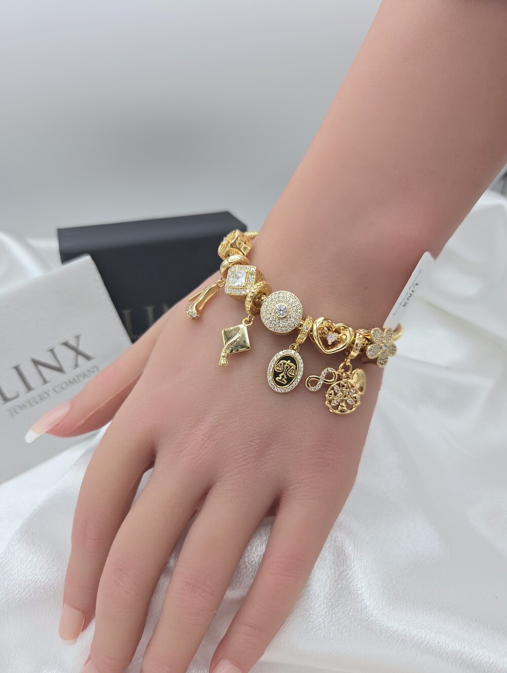 Linx Gold Snake Chain Bracelet With Lawyer Themed Charms